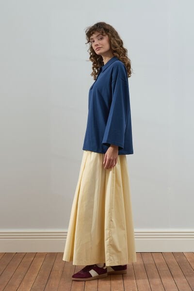 Lacivert Süprem Polo Yaka Body & Tereyağ Sarısı Pile Detay Etek Takım