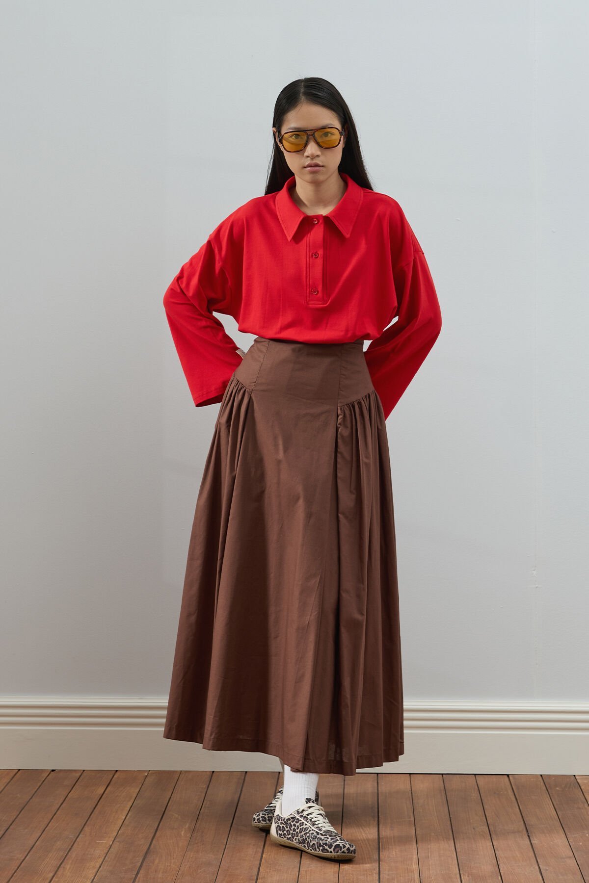 Kırmızı Süprem Polo Yaka Body & Acı Kahve Pile Detay Etek Takım